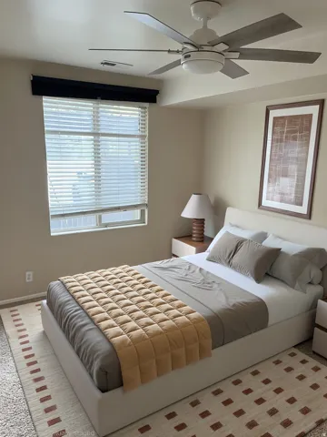 Recessed lighting, ceiling fan with integrated light fixture, window with blinds, and neutral wall tones
