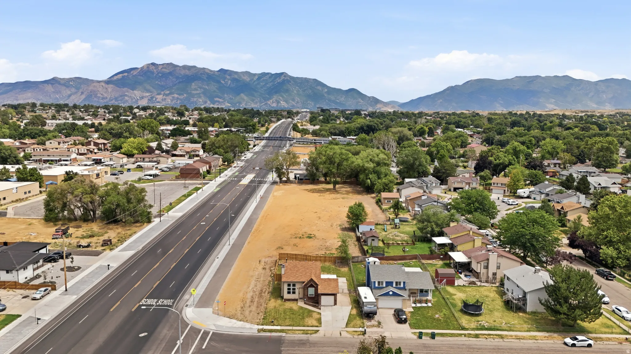 Aerial perspective showcasing a residential area with varied housing styles