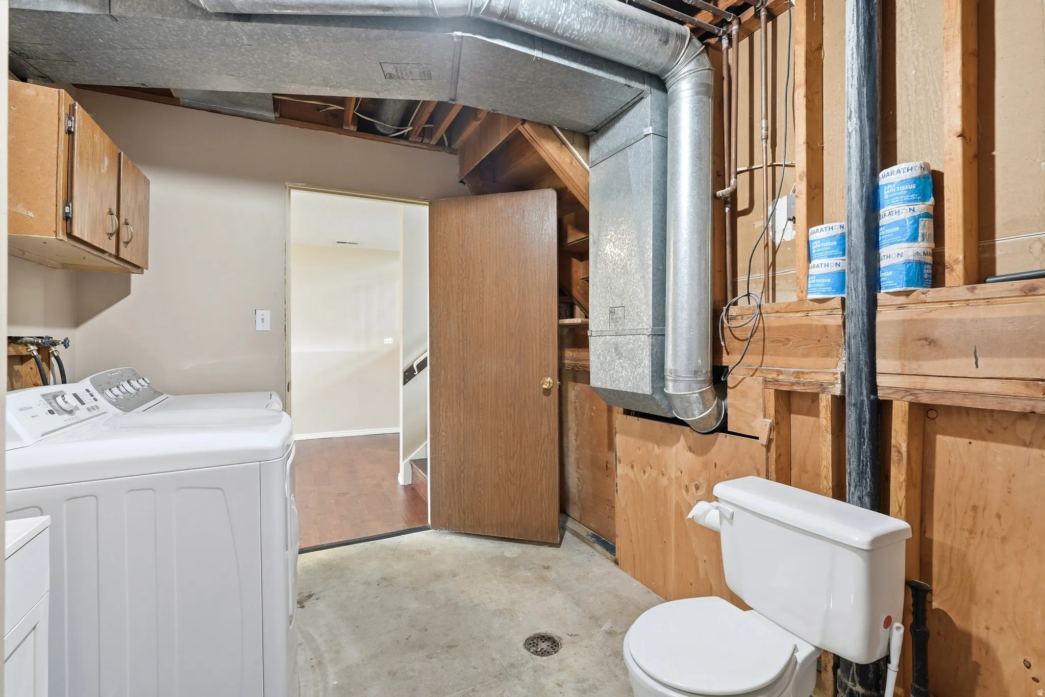 Laundry and half bathroom