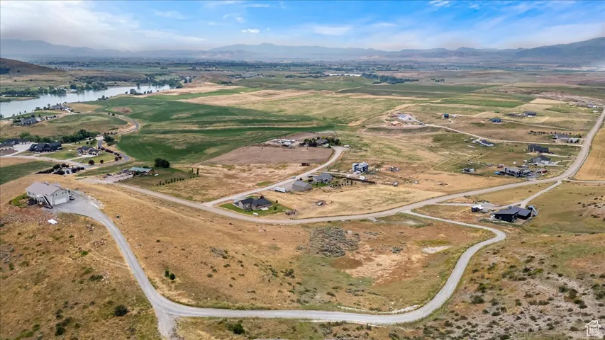 Expansive land parcel with surrounding residential properties