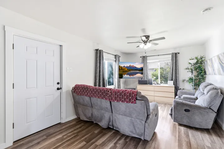 Open concept living room with plenty of natural light.