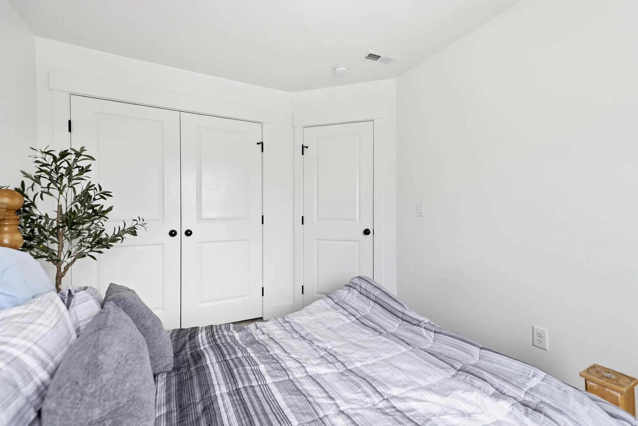 White-painted interior doors with dark hardware