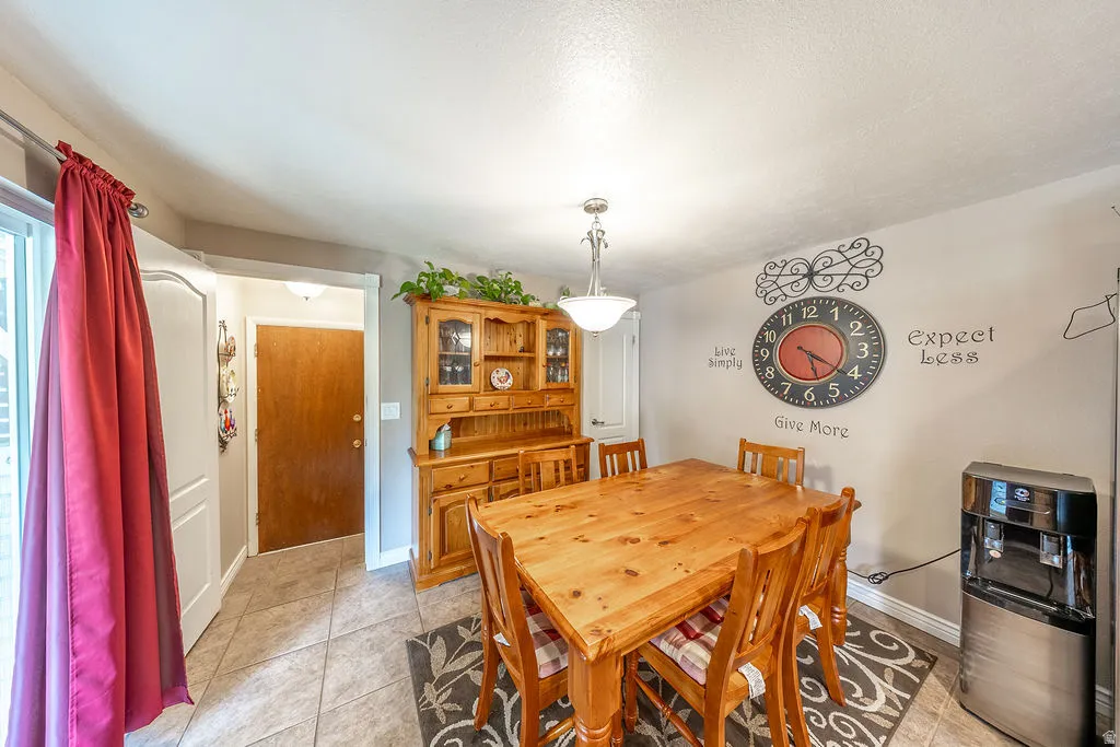 Dining area featuring tile flooring.