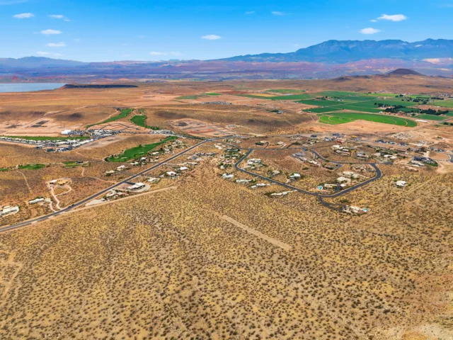 Expansive aerial showcasing a residential development within a desert landscape