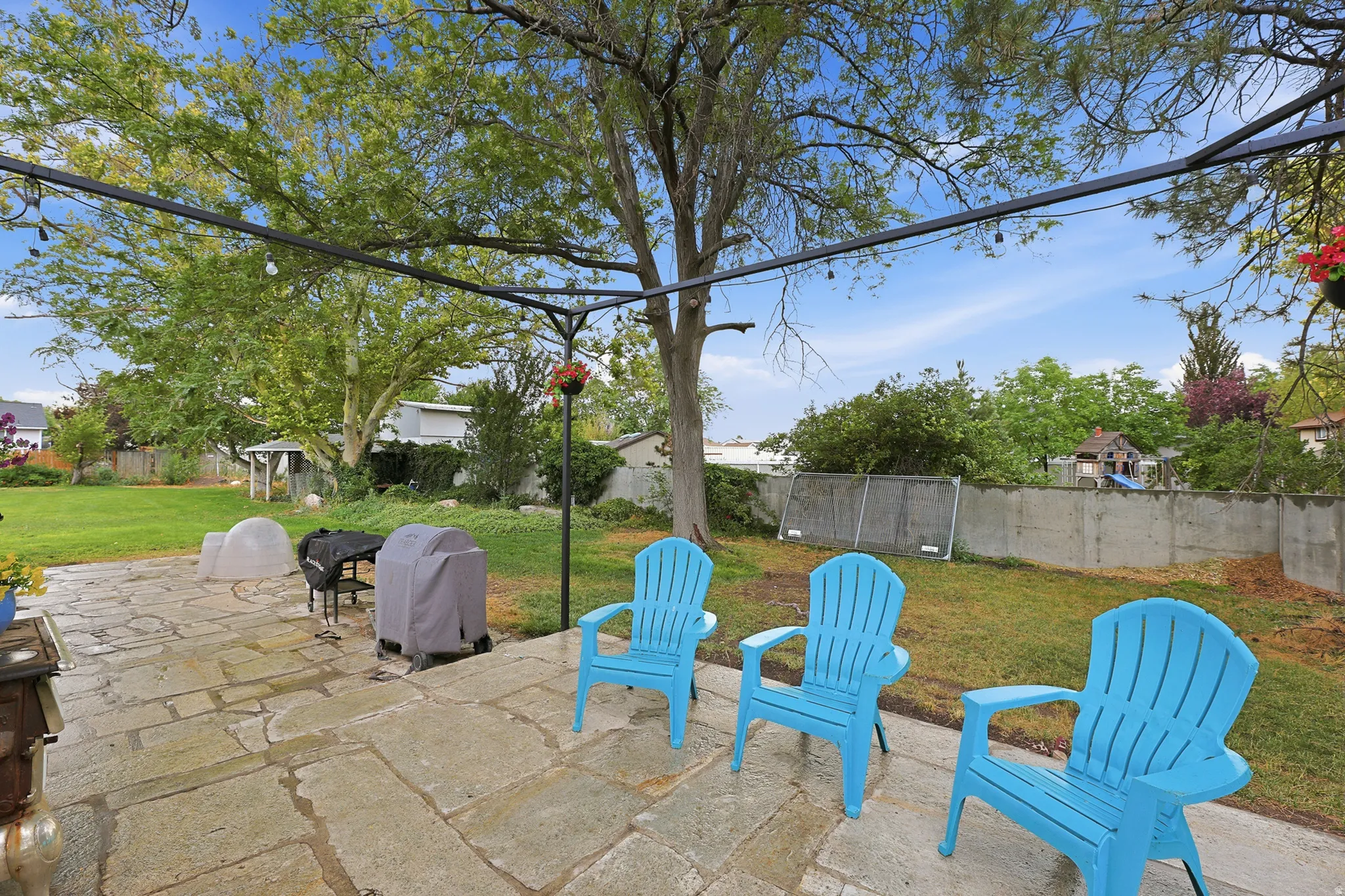Spacious outdoor patio featuring flagstone paving and newly installed patio framing