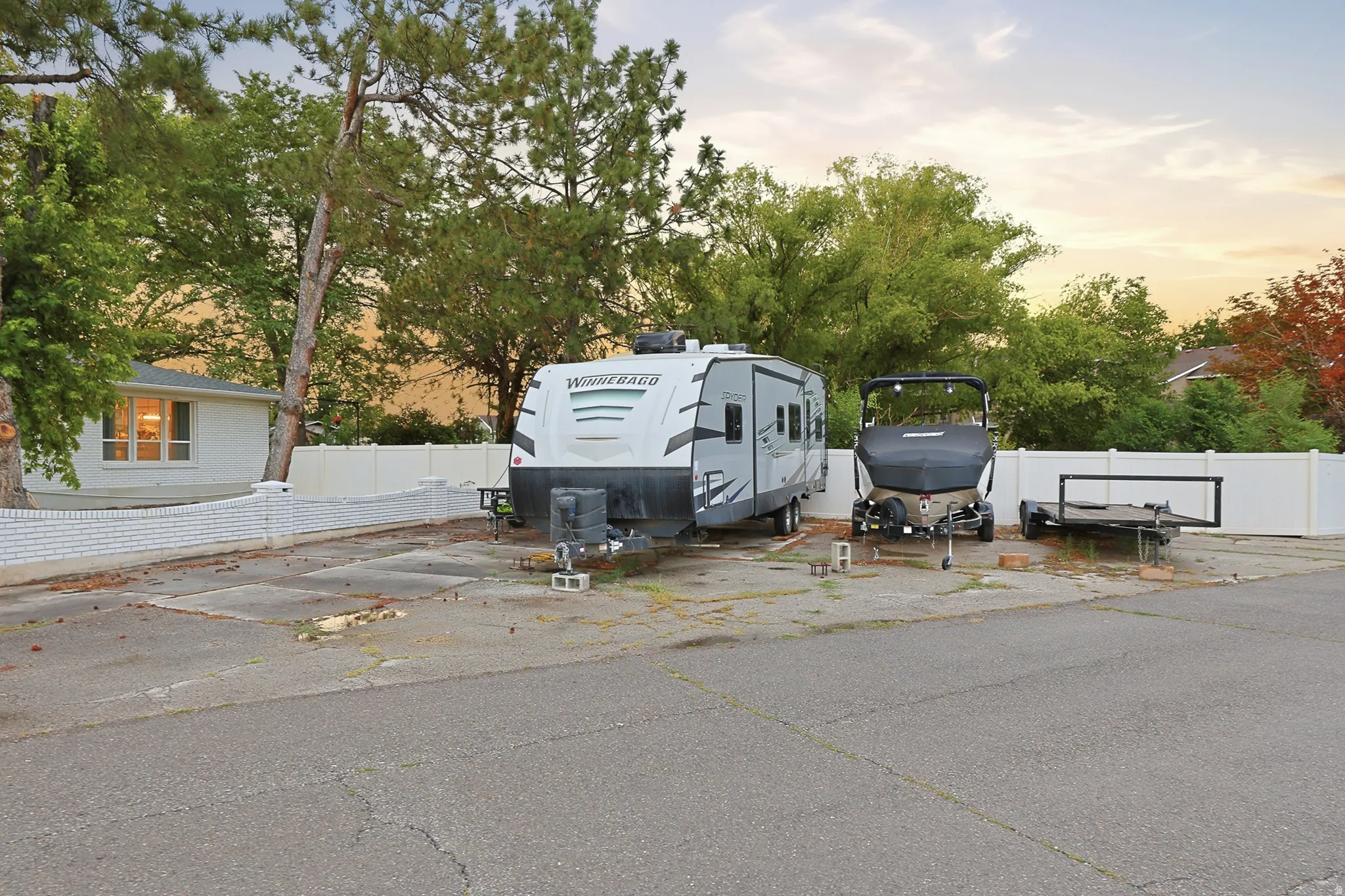 Paved parking area offering ample space for multiple vehicles