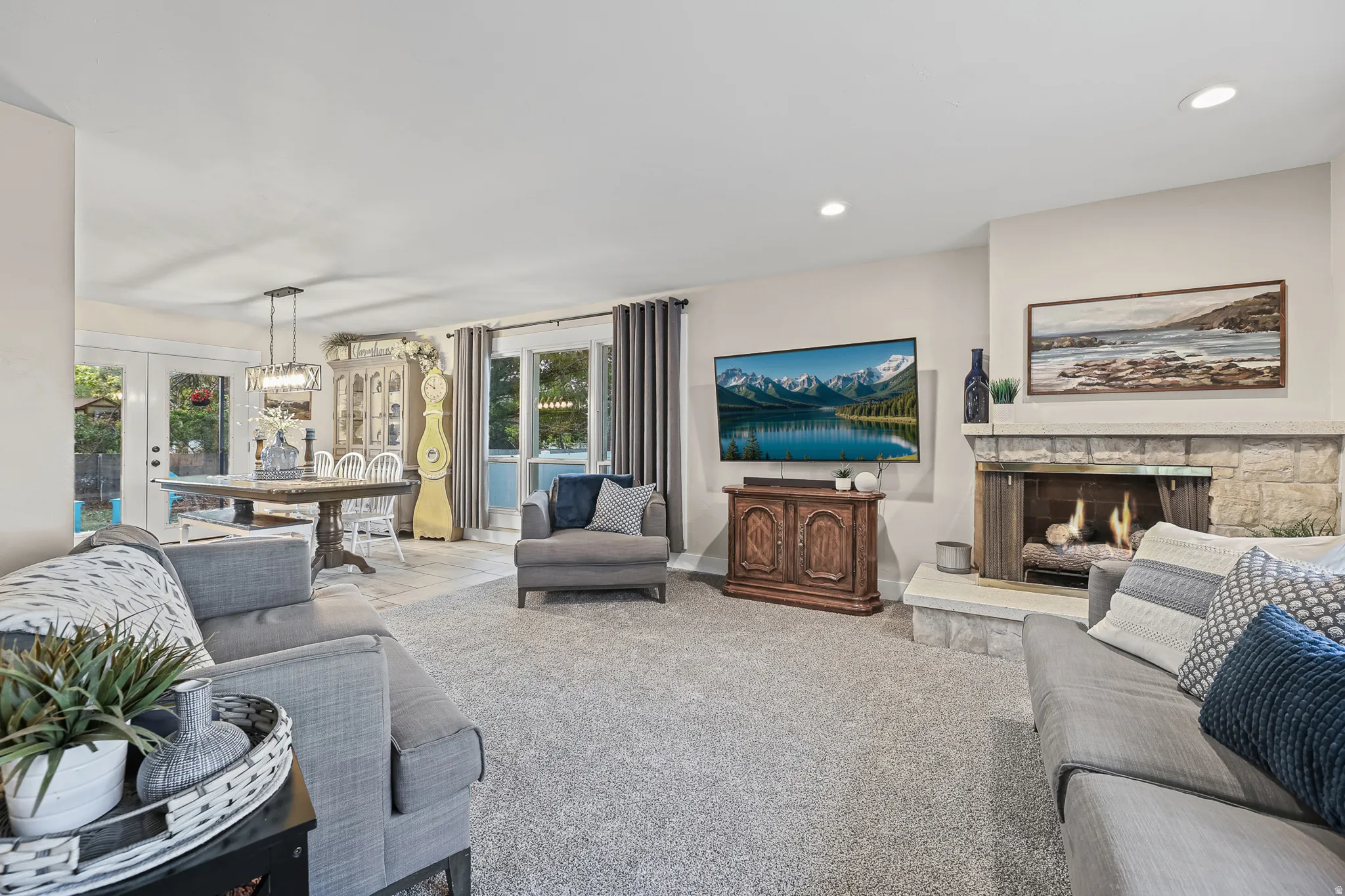 Living space featuring a stone fireplace
