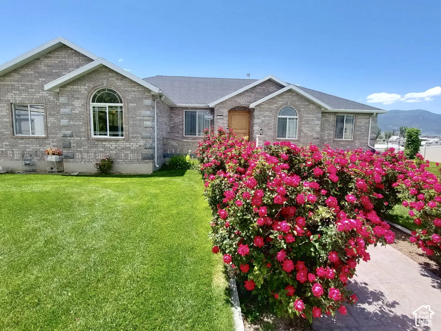 Custom Brick Ranch-Style Ramble with Beautiful Curb Appeal