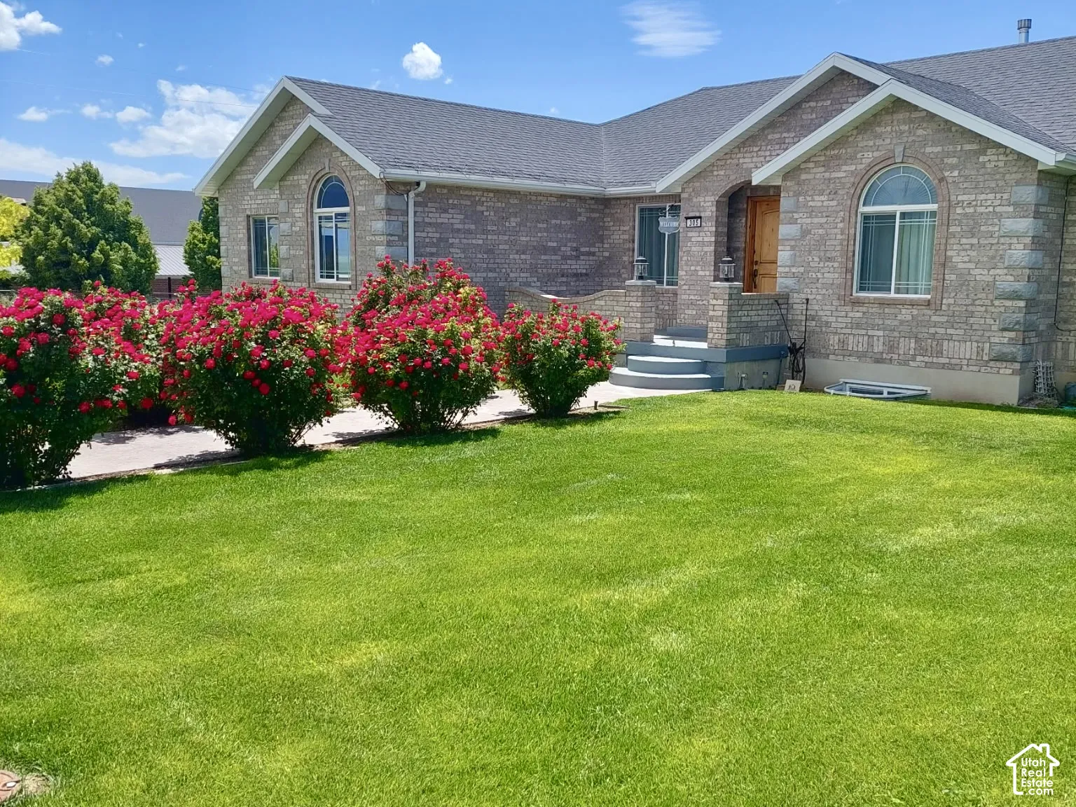Custom Brick Ranch-Style Ramble with Beautiful Curb Appeal