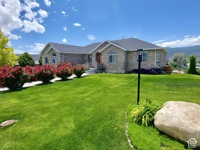 Custom Brick Ranch-Style Ramble with Beautiful Curb Appeal