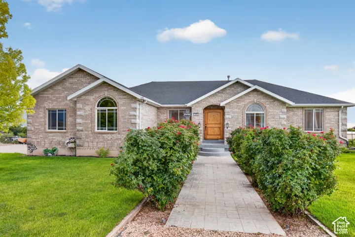 Custom Brick Ranch-Style Ramble with Beautiful Curb Appeal