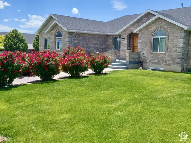 Custom Brick Ranch-Style Ramble with Beautiful Curb Appeal