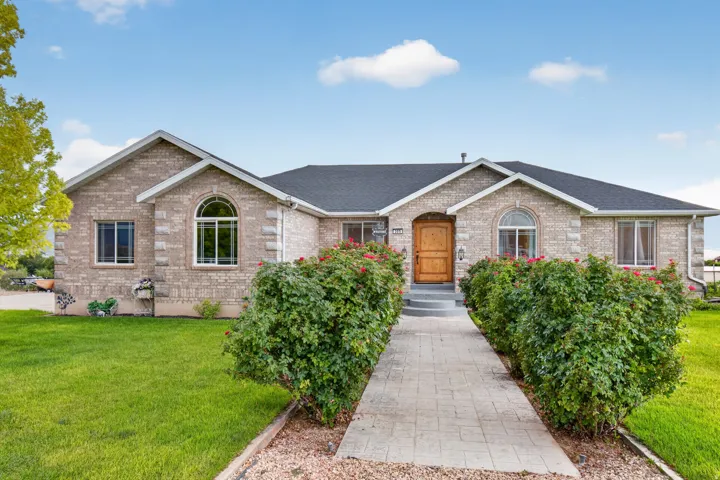 Custom Brick Ranch-Style Ramble with Beautiful Curb Appeal