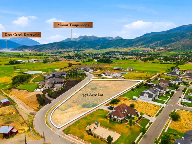 Expansive 3.77-acre lot with mountain backdrop and open terrain