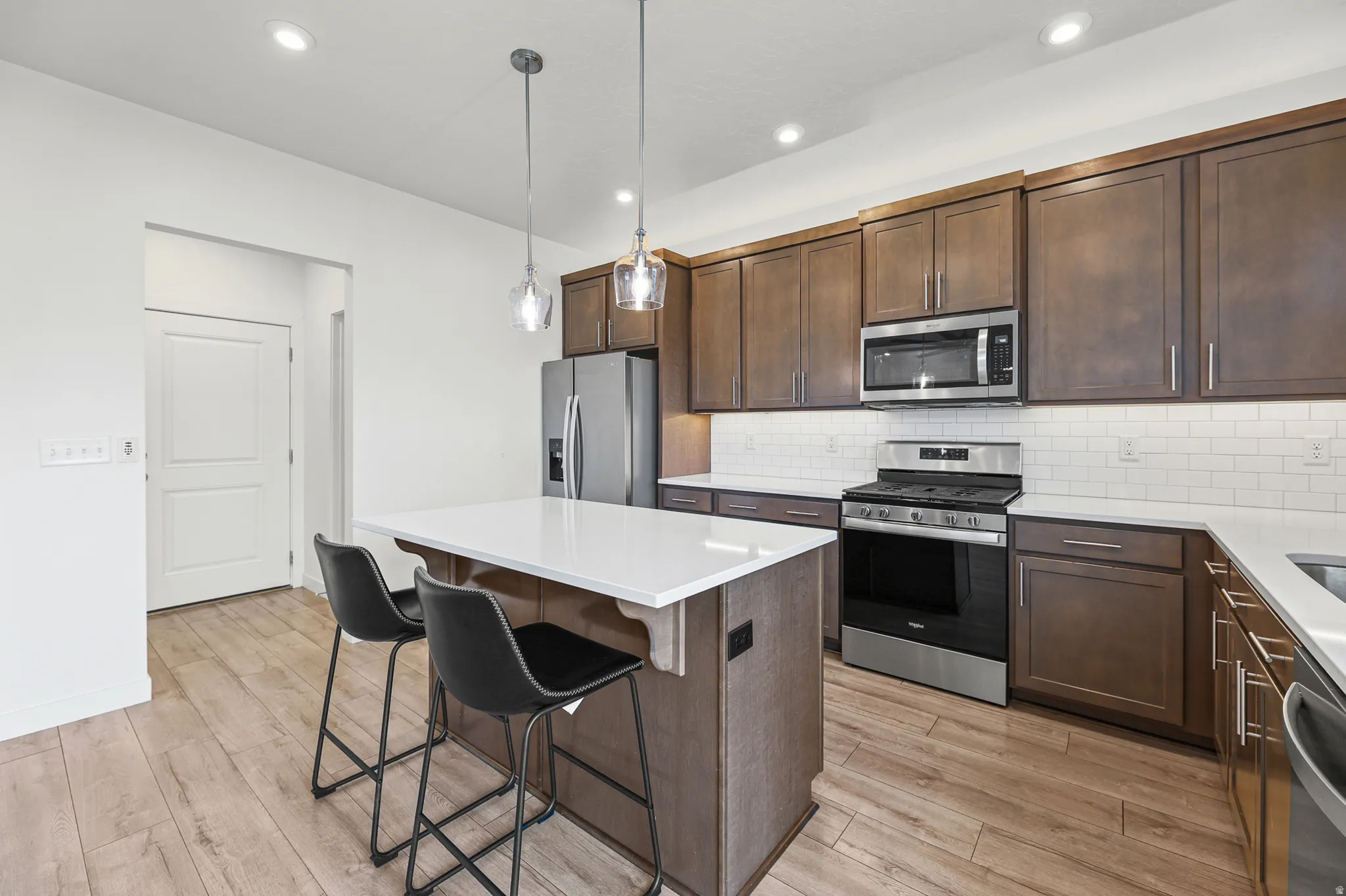 Kitchen featuring under cabinet lighting