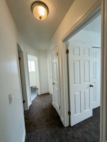 Top floor hallway to 3 bedrooms & bathroom