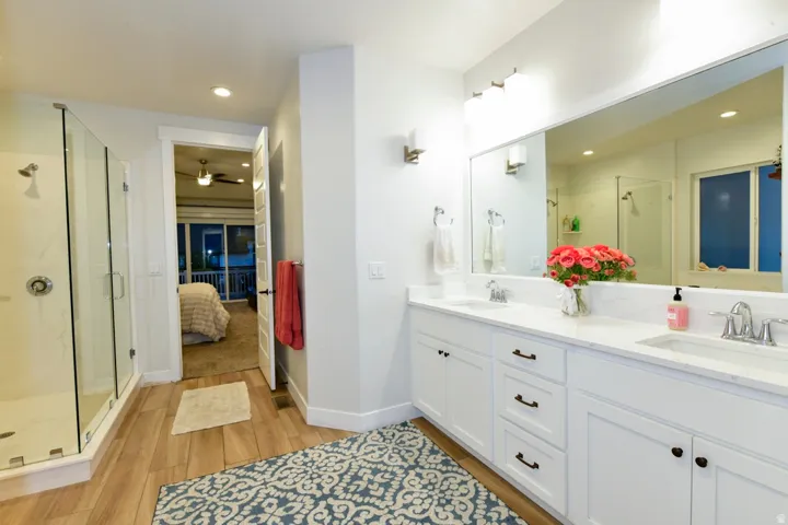 Dual vanity with stone countertop and undermount sinks