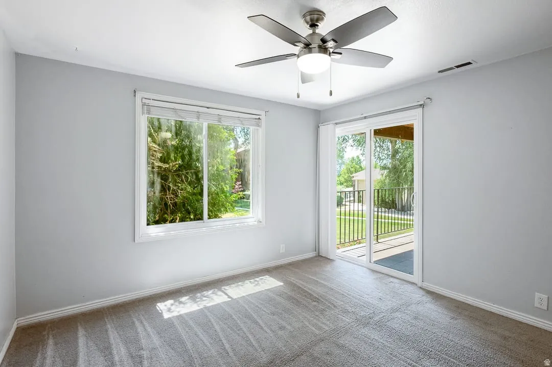 Light gray wall paint with white trim