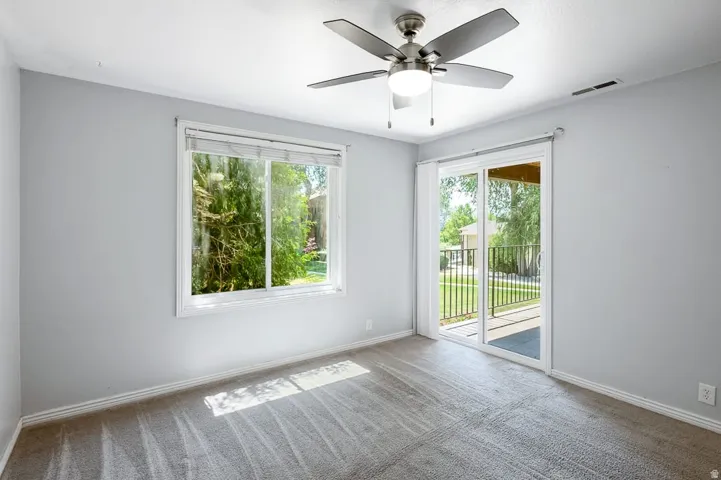 Light gray wall paint with white trim
