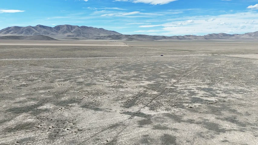 Expansive parcel featuring a distant mountain range and a clear sky