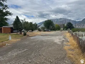 Gravel drive with mountain backdrop