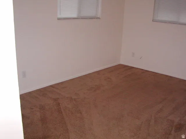 Light-colored walls featuring white trim