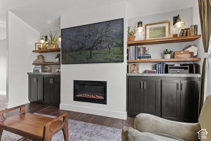 Integrated media wall featuring an electric fireplace and mounted television