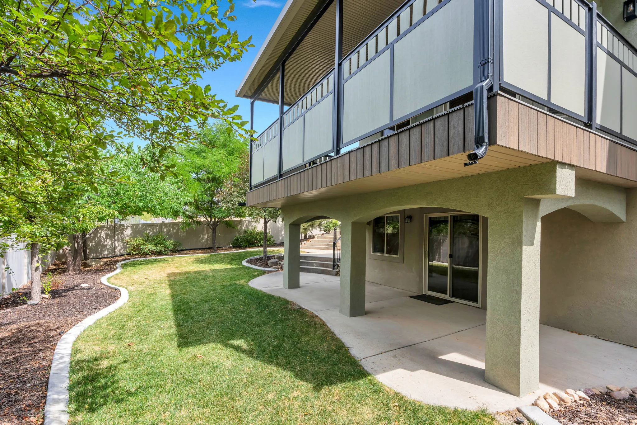 Upper-level composite deck with privacy panels