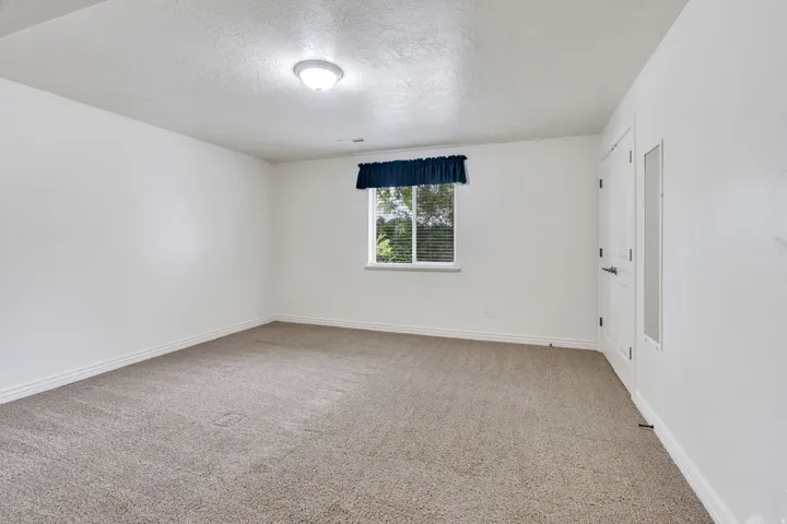 Neutral tone carpeting with white trim