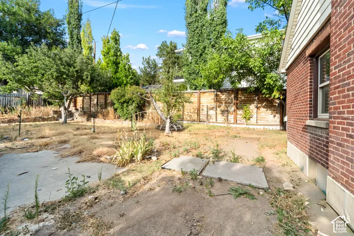 A spacious backyard with endless possibilities for outdoor living.