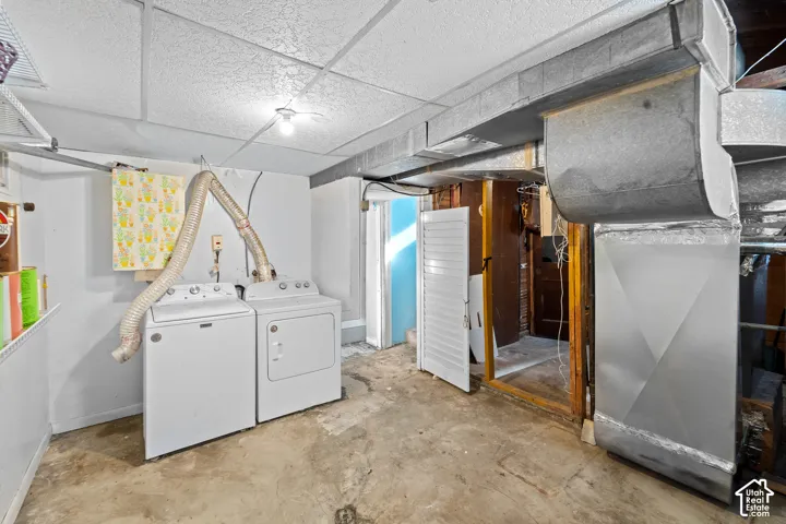 The very large laundry room has lots of potential and flexibility.