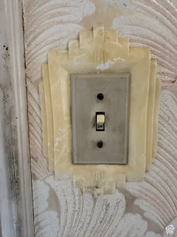 Charming light switch plate in the primary bedroom.