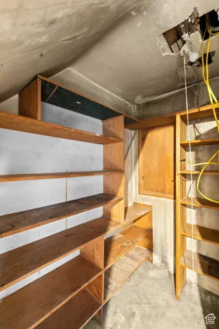 This storage room is just under the stairs next to the utility room.