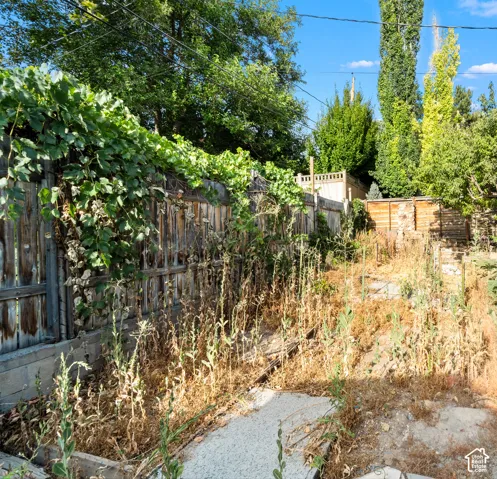 Located behind the garage the original alleyway has been deeded to this property and cloud be a great garden or privet sitting area!
