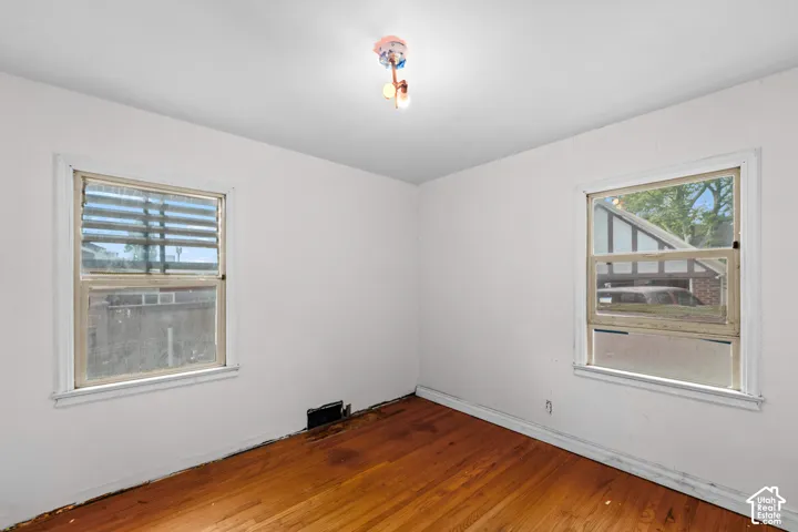 The second bedroom is spacious and has a deep closet.