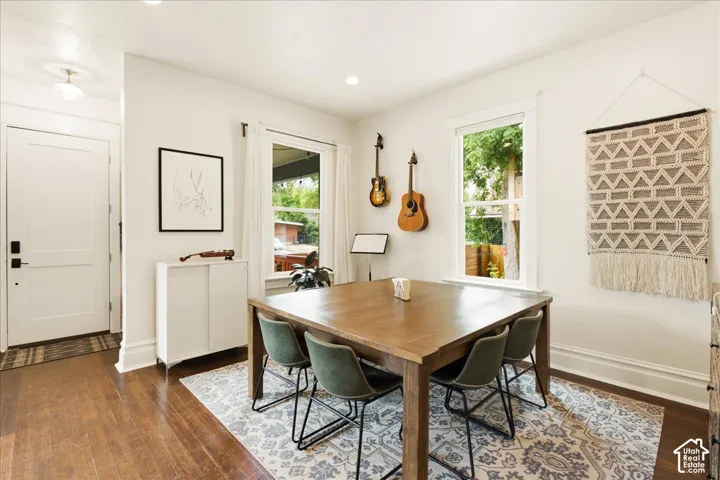 Hardwood flooring extending from the entry into the dining area