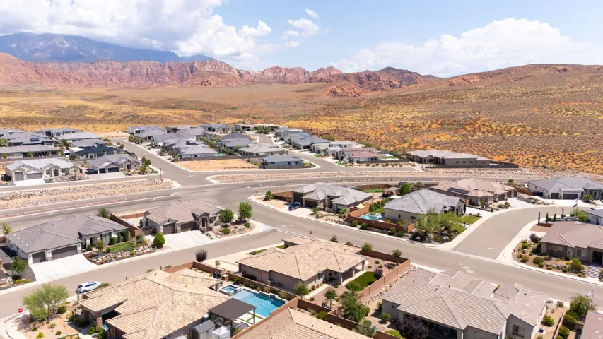 Expansive residential development featuring paved streets and manicured landscaping