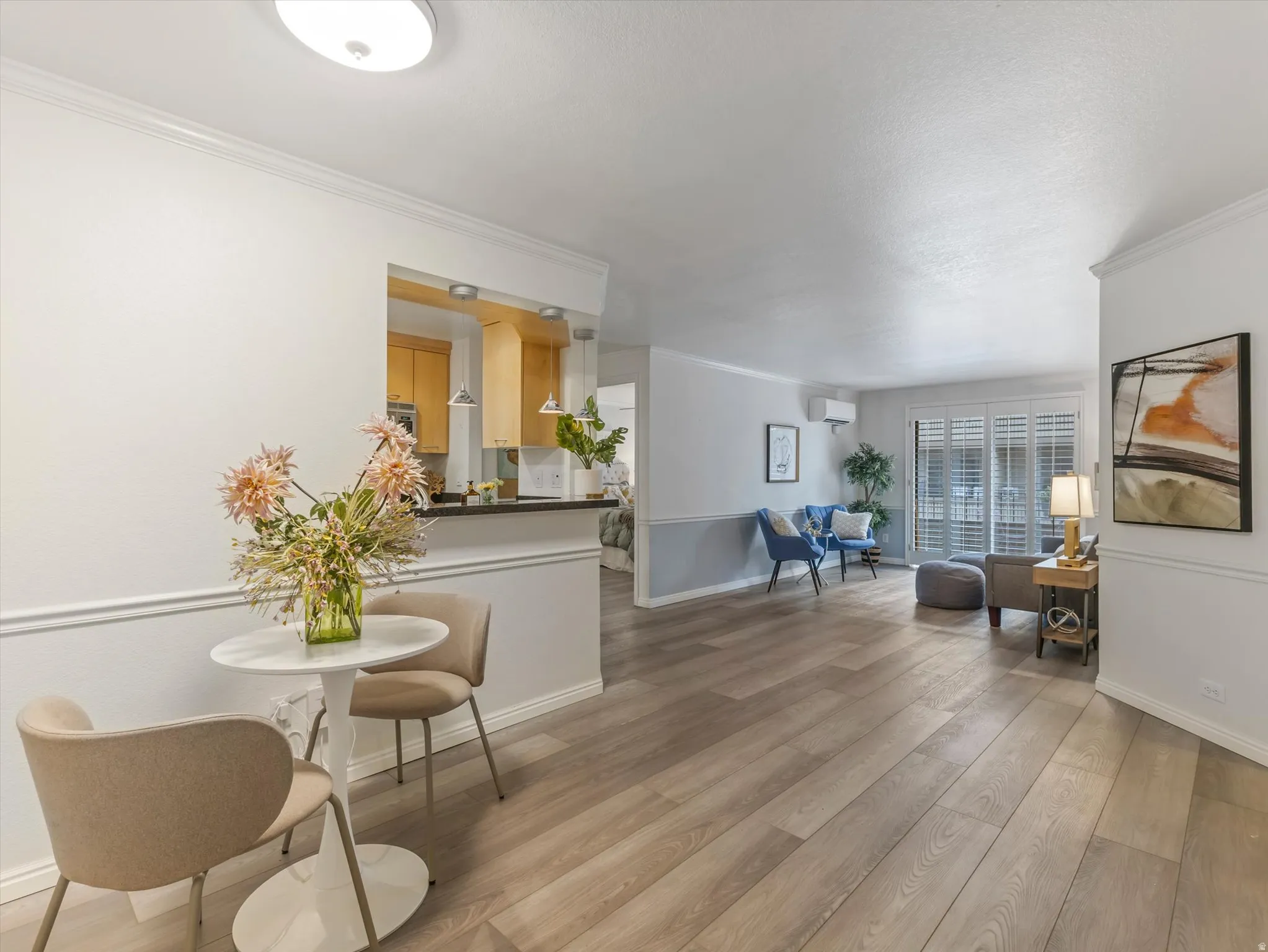Spacious interior featuring wood-finish flooring throughout