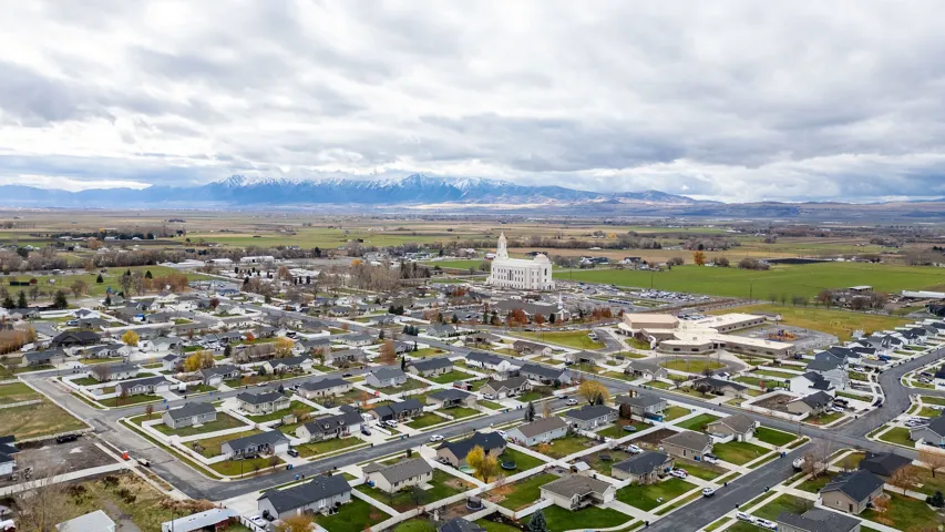 Aerial perspective showcasing a residential neighborhood with single-family homes and established streets
