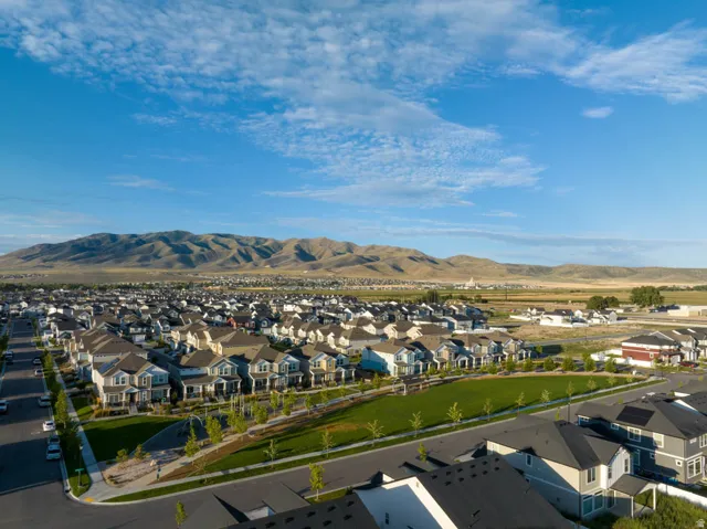 Aerial perspective showcasing a residential development with varied architectural styles