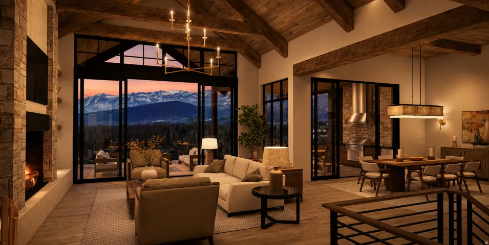Vaulted wood-paneled ceiling with exposed beams, stone fireplace, expansive sliding glass doors, built-in outdoor kitchen with stainless steel appliances, and a modern staircase with wrought iron railing