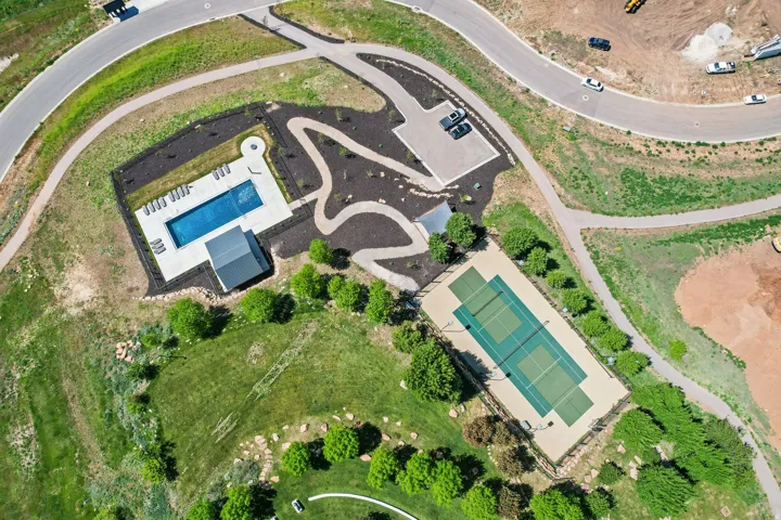 Community amenities featuring a swimming pool, tennis courts, and walking paths