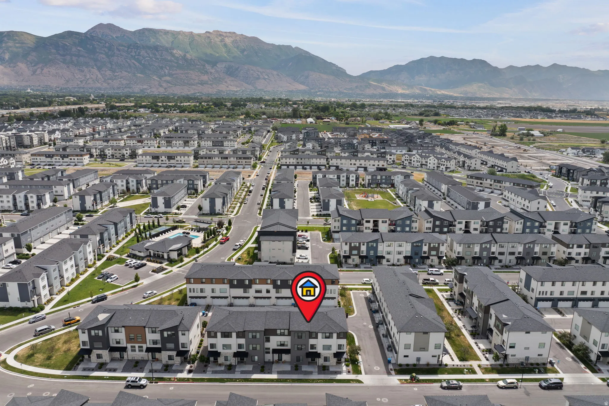 Modern townhome community with mountain backdrop