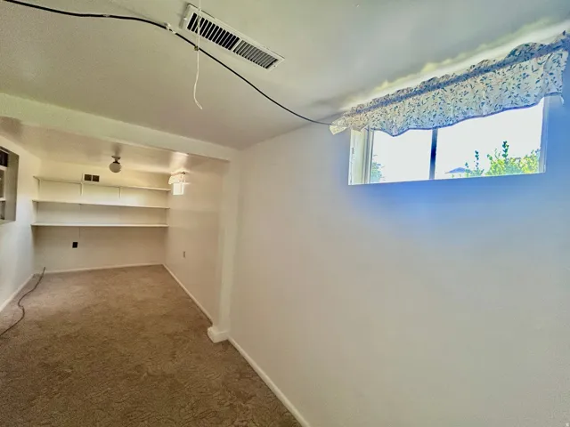 Bedroom with two windows