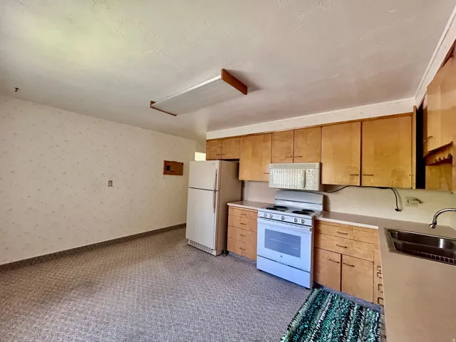 Fridge, range, microwave all included in the main floor kitchen