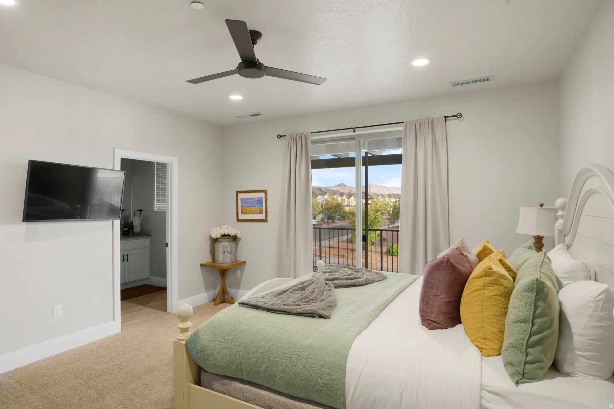 Bedroom featuring carpet flooring, a ceiling fan, recessed lighting, and a sliding glass door with balcony access