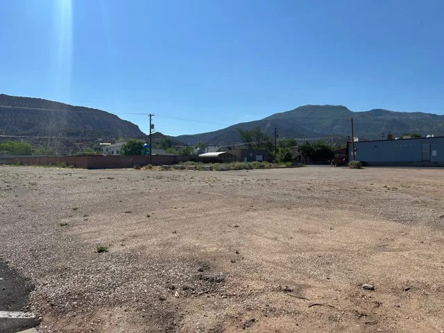 Expansive land parcel with gravel and dirt ground cover