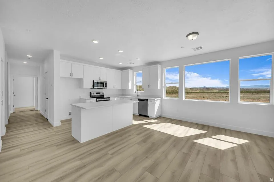 Representative photos of the same floor plan. Actual home may differ in finishes, colors, and options.