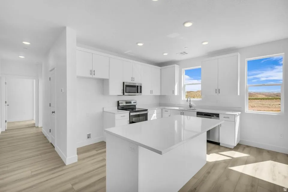 Representative photos of the same floor plan. Actual home may differ in finishes, colors, and options.