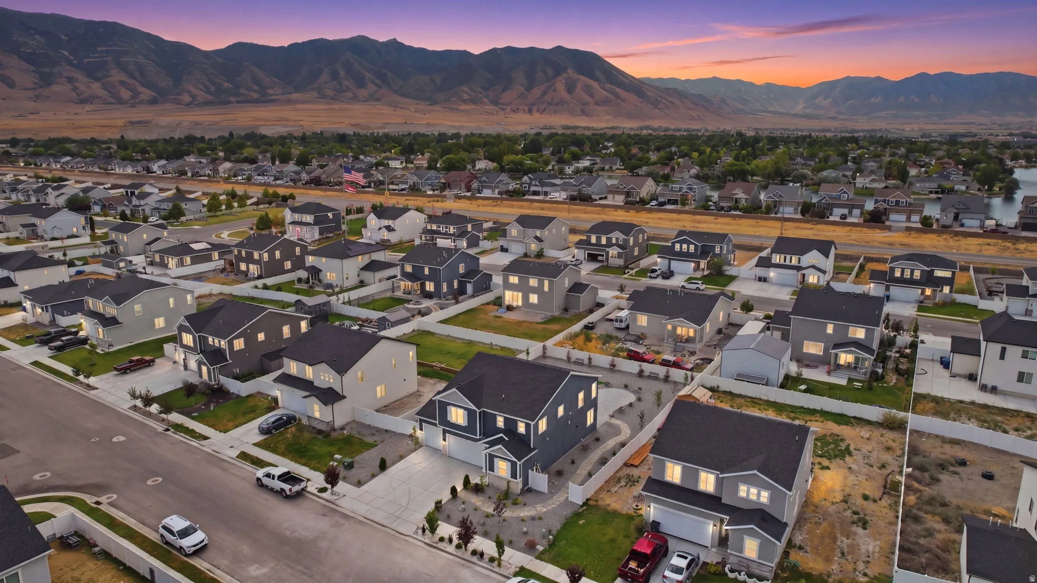 Contemporary residential development featuring a collection of homes with diverse exterior finishes